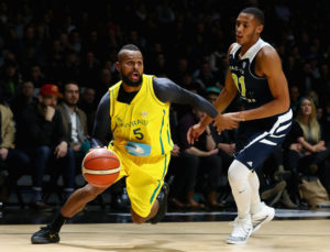 MELBOURNE, AUSTRALIA - JULY 12: Patty Mills of the Boomers dribbles the ball past Stephen Domingo of the All-Stars during the match between the Australian Boomers and the Pac-12 College All-Stars at Hisense Arena on July 12, 2016 in Melbourne, Australia. (Photo by Quinn Rooney/Getty Images)