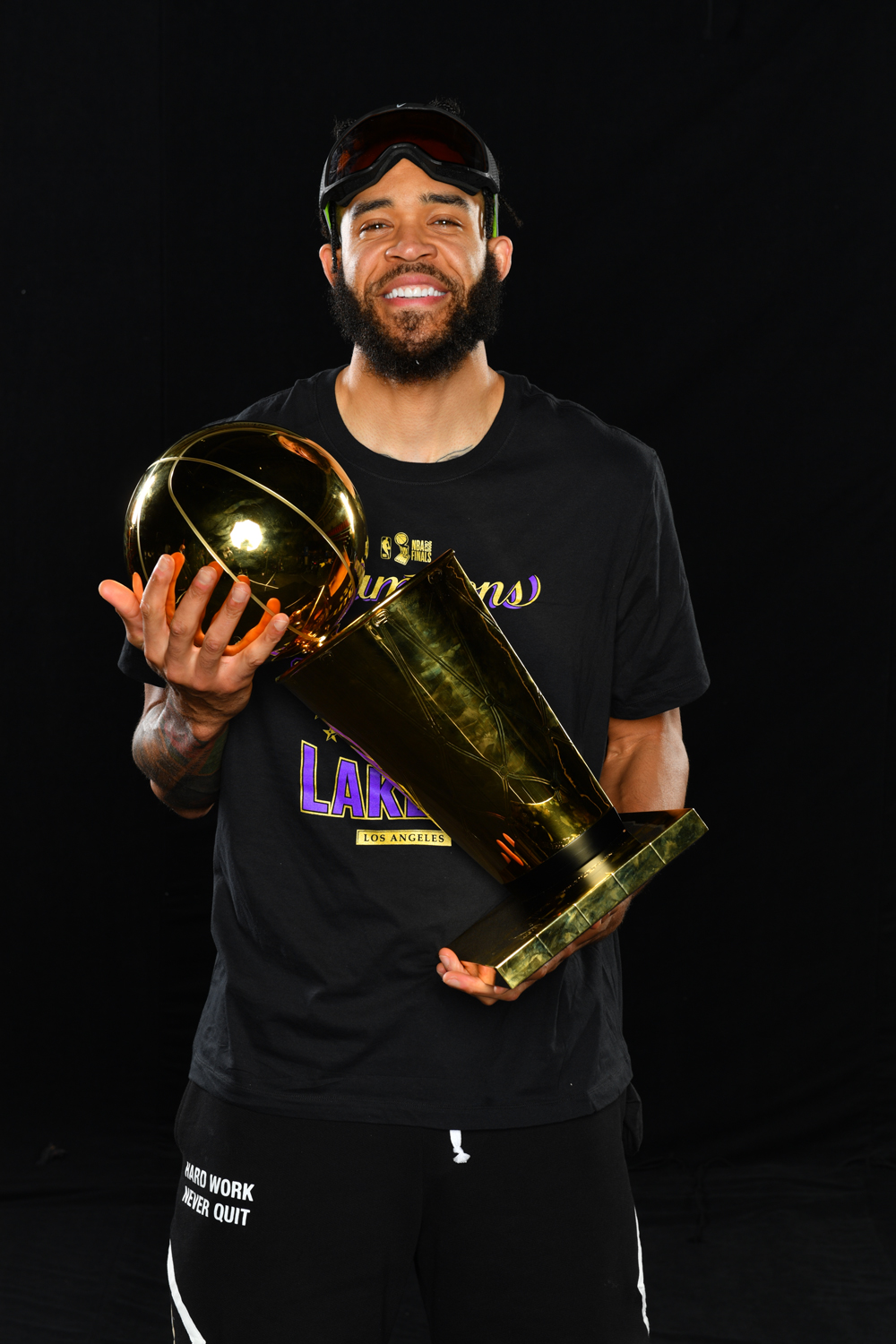 JaVale McGee with NBA championship trophy