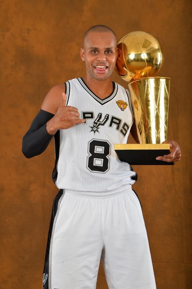 Patty Mills with NBA trophy